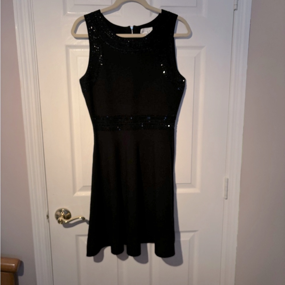 Black Knitted Dress with embroidered beads.